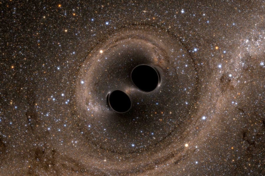 Samensmeltende zwarte gaten veroorzaken zwaartekrachtsgolven.