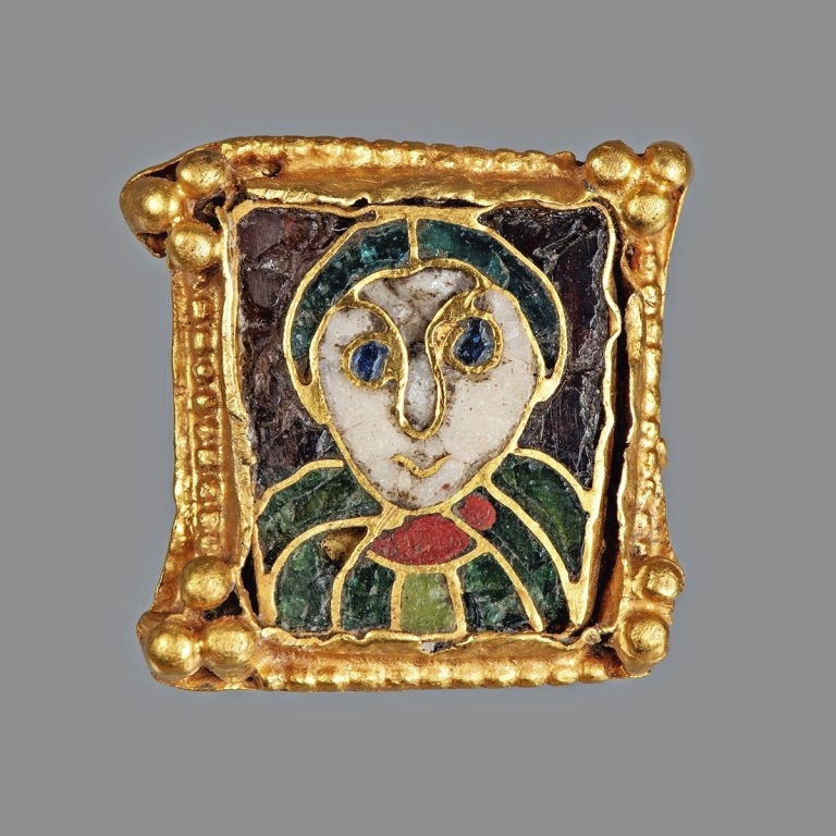 Mantelspeld met mannenkopje (fibula) uit 800-900.