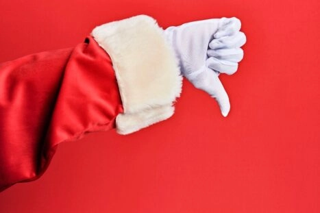 kerstmis, hand kerstman met duim naar beneden