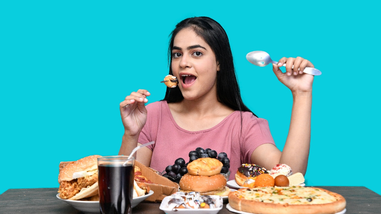 meisje met vet eten, kunnen balletjes van groene thee voorkomen dat ze die vetten opneemt?