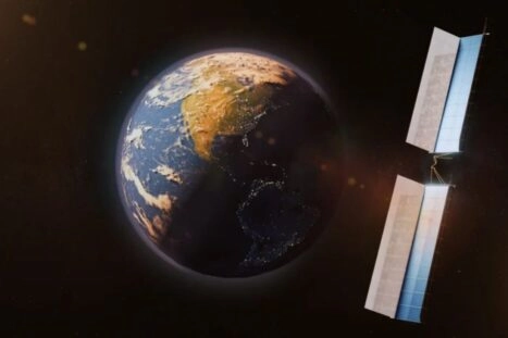 Tekening van satelliet in baan om de aarde