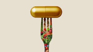 vork gemaakt van groeten met een pil op de punten, ter illustratie van een plantaardig dieet dat gezondheidsklachten vermindert