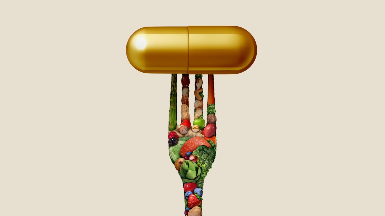 vork gemaakt van groeten met een pil op de punten, ter illustratie van een plantaardig dieet dat gezondheidsklachten vermindert