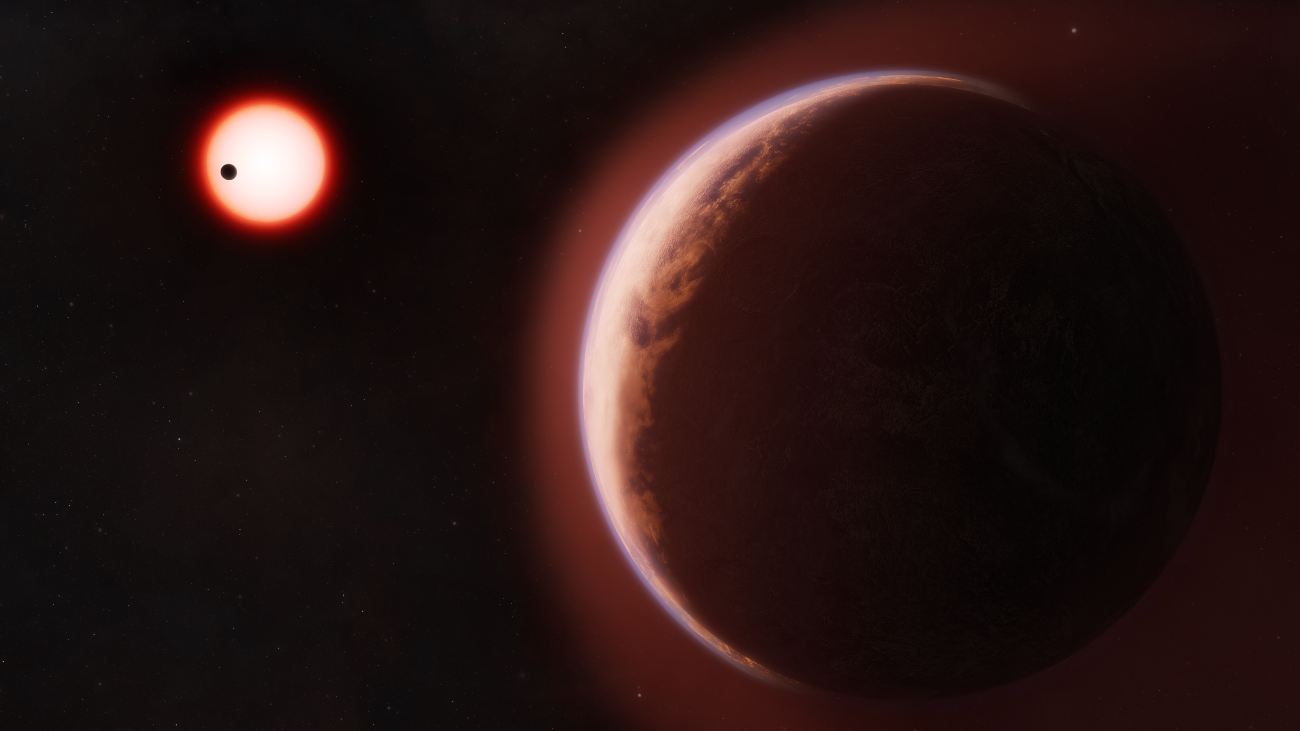 Een artistieke impressie van de exoplaneet LHS 1140 b, omgeven door een heliumrijke atmosfeer. In de achtergrond zie je hoe een andere rotsachtige planeet rond dezelfde rode dwergster draait.