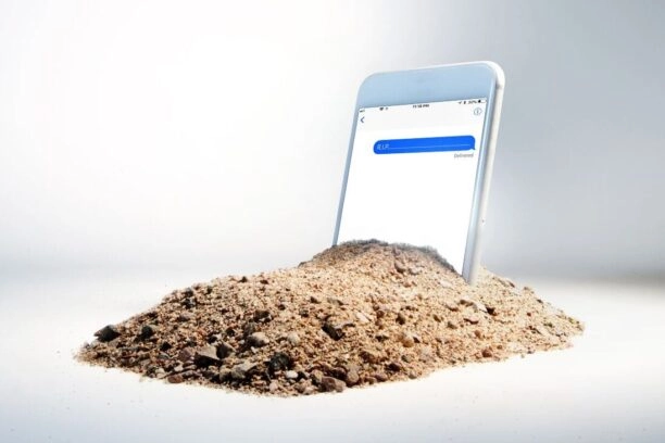 telefoon in een graf, ter illustratie van een rouwbot